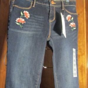 Blue jeans with flowers